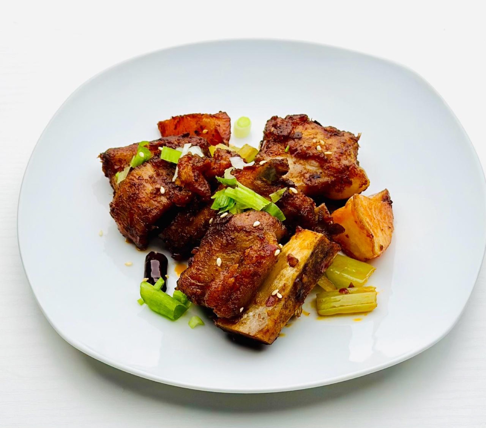 Spicy Pork Ribs Spicy pork ribs with sesame and scallion